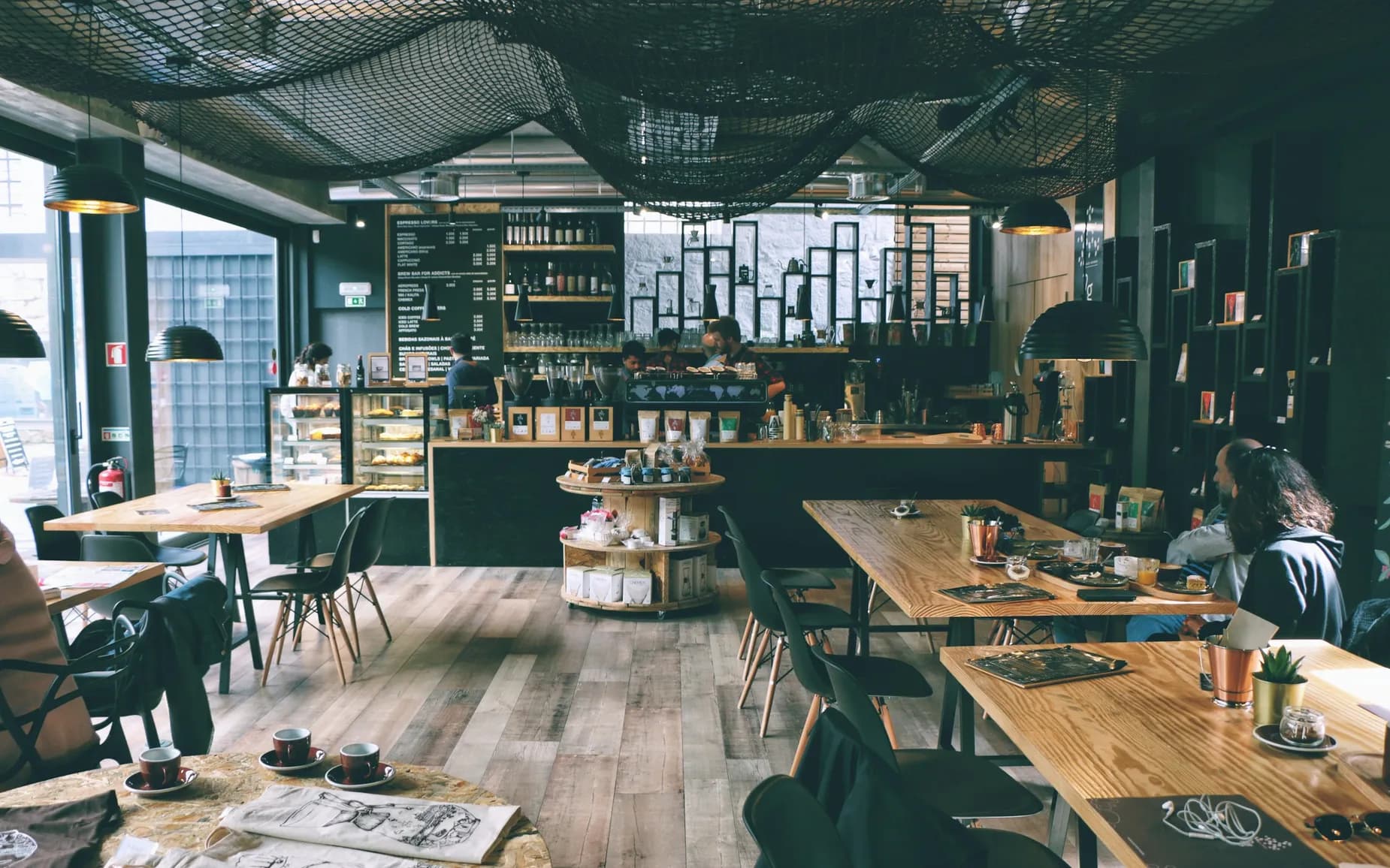 A café customer using free WiFi from Purple